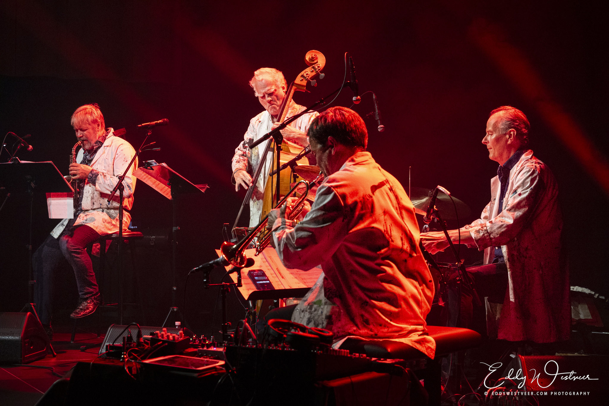 Arcanum live on stage, red lights