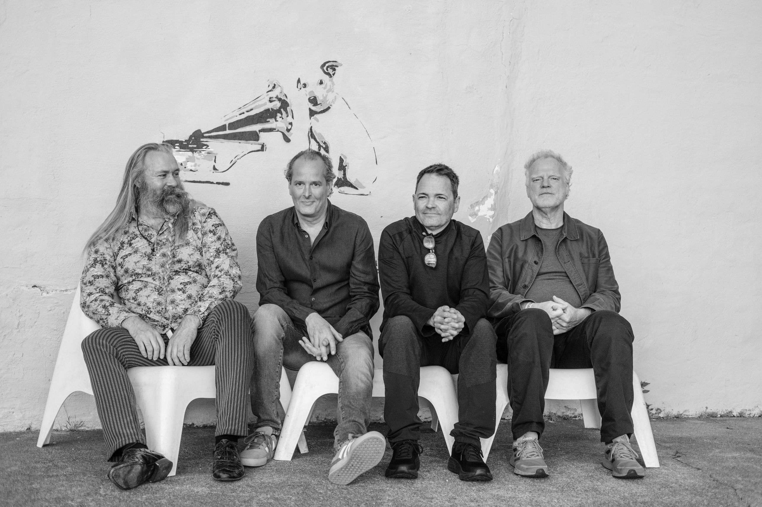 Arcanum — the quartet seated, black & white